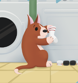 Paps, Heaven's dog, holding a sock in the laundry room
